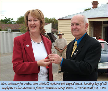 Hon. Minister for Police, Mrs Michelle Roberts BA DipEd MLA, handing key of old Highgate Police Station to former Commissioner of Police, Mr Brian Bull AO, APM